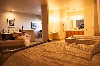 Romance Suite bathroom with couples bathtub